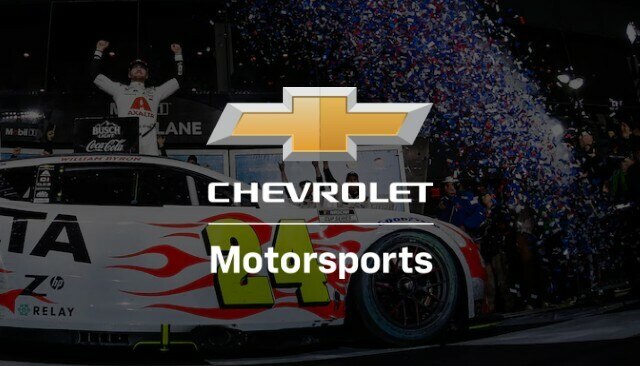 The Chevrolet Motorsports Racecar and Team Chevy Driver Celebrating a NASCAR Win.