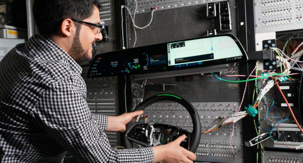 Close-up of a GM Team Member Working on Steering Technology in a Control Room